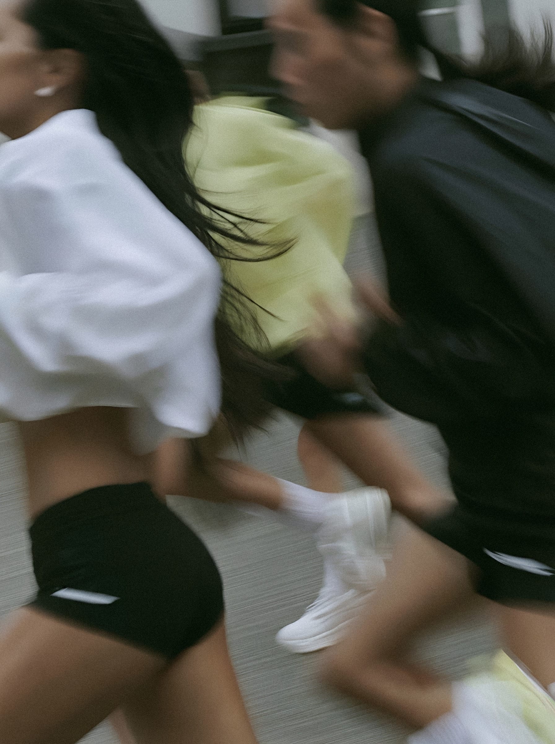 Bodies in motion yellow and white.